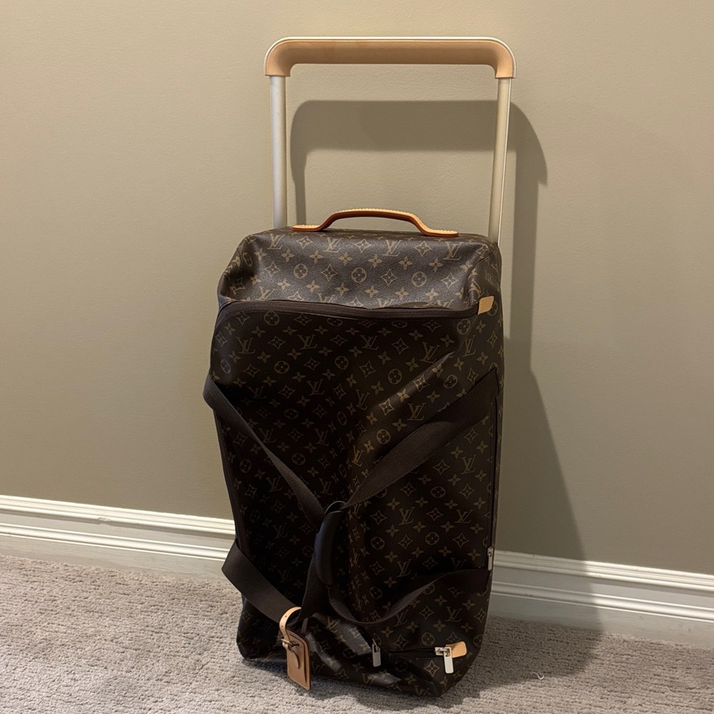 Louis Vuitton Monogram Canvas Rolling Carry-On Duffle.